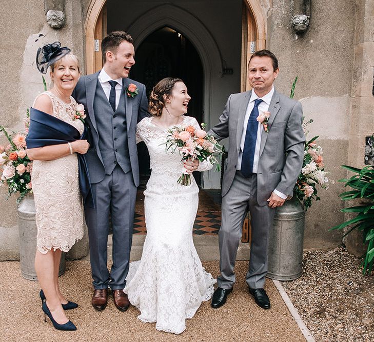 Bride in Lace Wedding Dress | Groom in Next Suit | Peach Wedding at Swanton Morley House and Gardens in Norfolk |  Jason Mark Harris Photography | Together we Roam Films