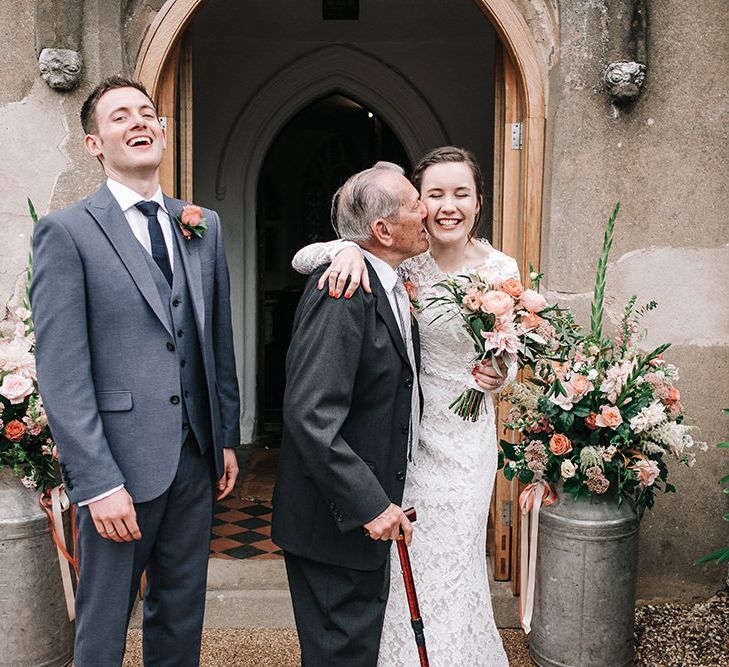 Bride in Lace Wedding Dress | Groom in Next Suit | Peach Wedding at Swanton Morley House and Gardens in Norfolk |  Jason Mark Harris Photography | Together we Roam Films