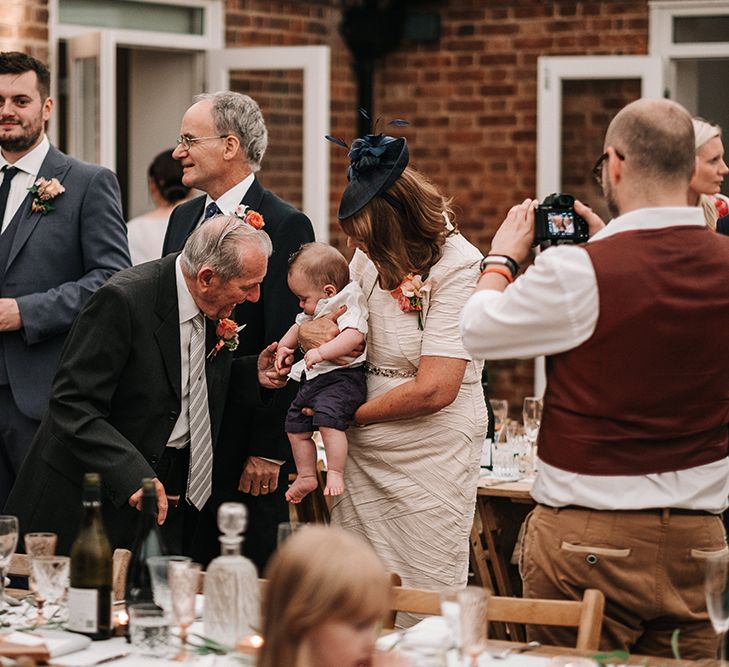 Wedding Guests | Peach Wedding at Swanton Morley House and Gardens in Norfolk |  Jason Mark Harris Photography | Together we Roam Films