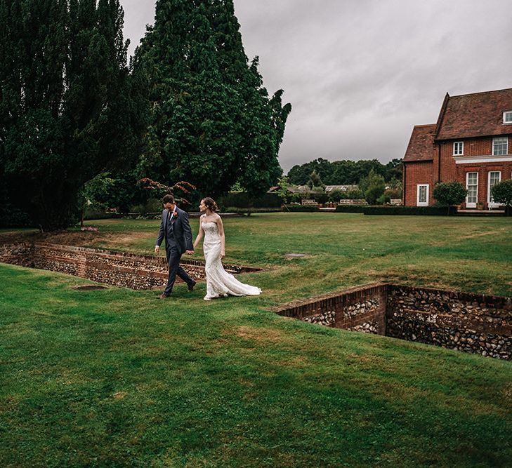 Bride in Lace Wedding Dress | Groom in Next Suit | Peach Wedding at Swanton Morley House and Gardens in Norfolk |  Jason Mark Harris Photography | Together we Roam Films