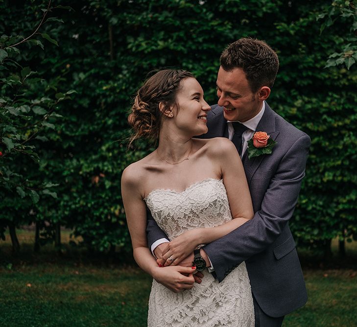 Bride in Lace Wedding Dress | Groom in Next Suit | Peach Wedding at Swanton Morley House and Gardens in Norfolk |  Jason Mark Harris Photography | Together we Roam Films