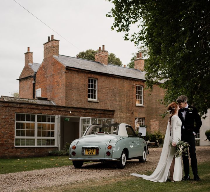 Bride in Alexandra Grecco  wedding dress at Aswarby Rectory wedding