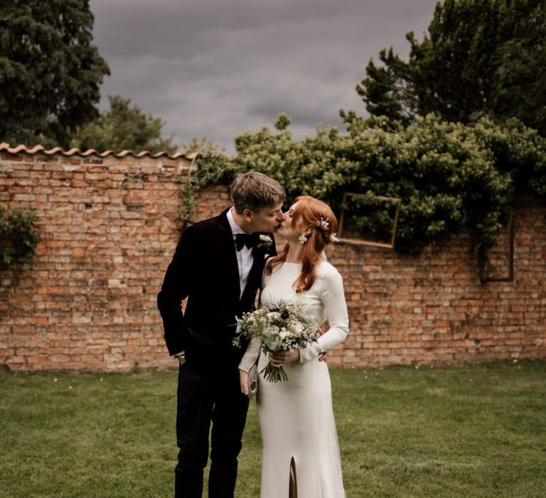 Bride and portrait with bride in Alexandra Grecco wedding dress with long sleeves