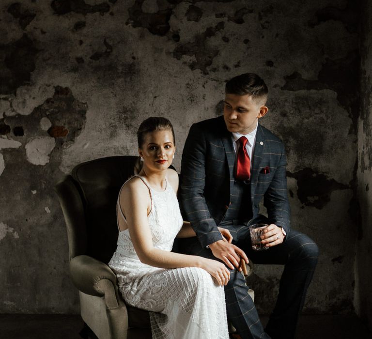 Bride and Groom Sitting on a Chair