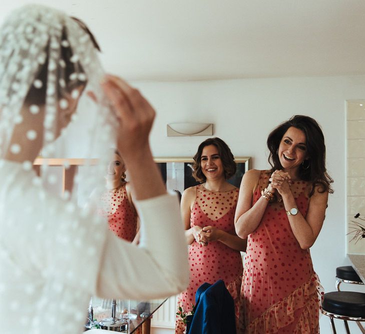 Wedding Morning Bridesmaids in Polka Dot Orange Bridesmaid Dresses First Look