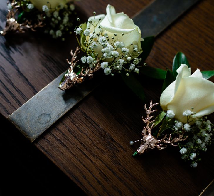 White Rose and Gypsophila Buttonholes with Stag Pins