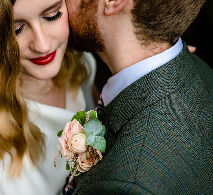 Close Up of Brides Vintage Hair and Makeup and Grooms Pink Rose Buttonhole