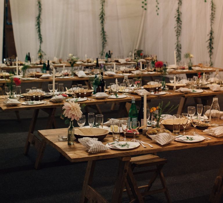 Rustic Wedding Reception with Trailing Fairy Lights Decor and Foliage Wedding Decor