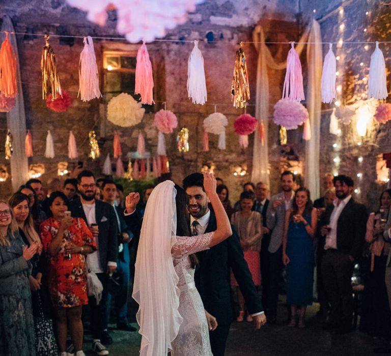 Bride and Groom Enjoying First Dance in Catherine Deane Wedding Dress and Paul Smith Suit