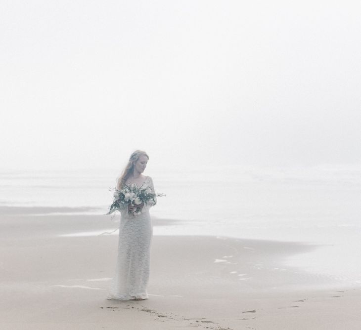 Bride in This Modern Love Bridal Lace Wedding Dress | Romantic Runaway Bride Wedding Inspiration at Chapel Porth beach in Cornwall, Styled by Boelle Events | Olivia Bossert Photography