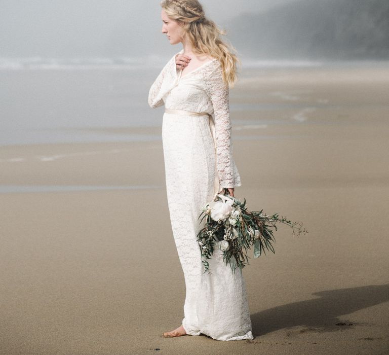 Bride in This Modern Love Bridal Lace Wedding Dress | Romantic Runaway Bride Wedding Inspiration at Chapel Porth beach in Cornwall, Styled by Boelle Events | Olivia Bossert Photography