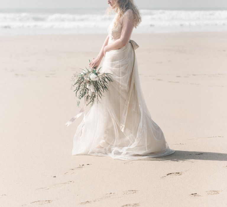 Bride in This Modern Love Bridal Lace Wedding Dress | Romantic Runaway Bride Wedding Inspiration at Chapel Porth beach in Cornwall, Styled by Boelle Events | Olivia Bossert Photography