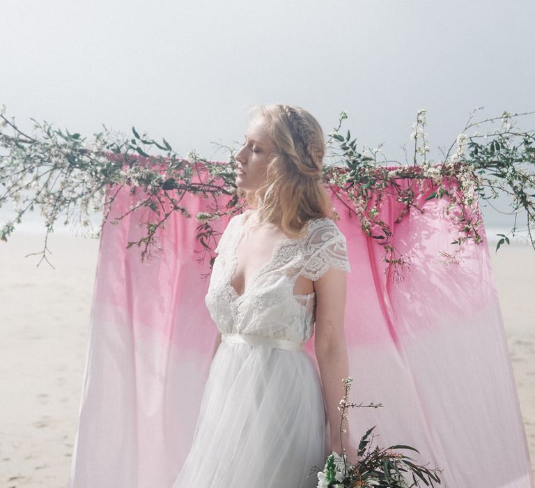 Bride in This Modern Love Bridal Lace Wedding Dress | Romantic Runaway Bride Wedding Inspiration at Chapel Porth beach in Cornwall, Styled by Boelle Events | Olivia Bossert Photography