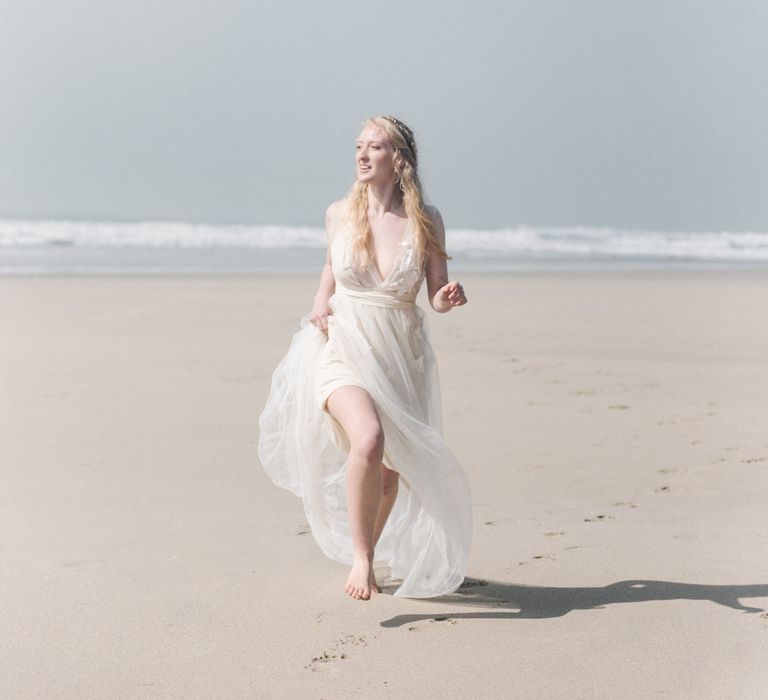 Bride in This Modern Love Bridal Lace Wedding Dress | Romantic Runaway Bride Wedding Inspiration at Chapel Porth beach in Cornwall, Styled by Boelle Events | Olivia Bossert Photography