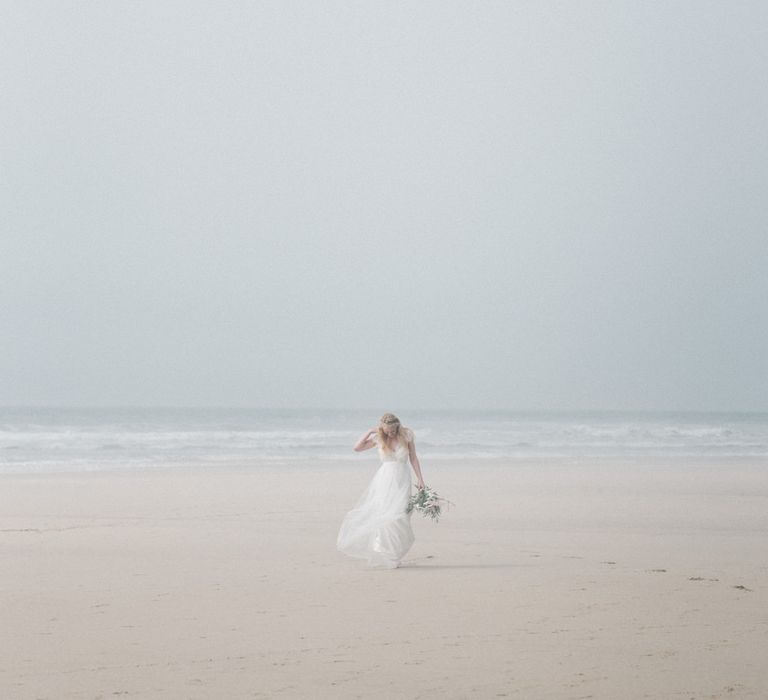 Bride in This Modern Love Bridal Lace Wedding Dress | Romantic Runaway Bride Wedding Inspiration at Chapel Porth beach in Cornwall, Styled by Boelle Events | Olivia Bossert Photography