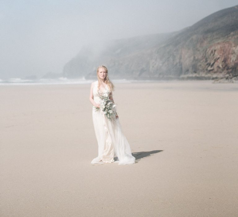 Bride in This Modern Love Bridal Lace Wedding Dress | Romantic Runaway Bride Wedding Inspiration at Chapel Porth beach in Cornwall, Styled by Boelle Events | Olivia Bossert Photography