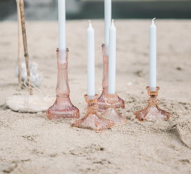 Blush Candlesticks Wedding Decor | Romantic Runaway Bride Wedding Inspiration at Chapel Porth beach in Cornwall, Styled by Boelle Events | Olivia Bossert Photography