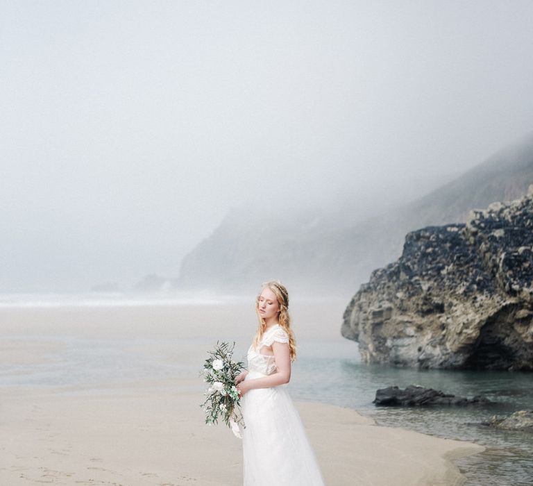 Bride in This Modern Love Bridal Lace Wedding Dress | Romantic Runaway Bride Wedding Inspiration at Chapel Porth beach in Cornwall, Styled by Boelle Events | Olivia Bossert Photography