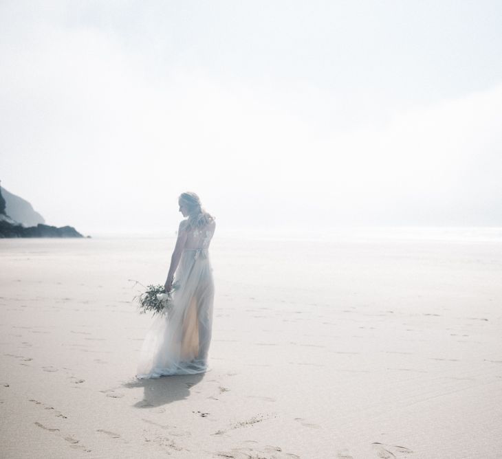 Bride in This Modern Love Bridal Lace Wedding Dress | Romantic Runaway Bride Wedding Inspiration at Chapel Porth beach in Cornwall, Styled by Boelle Events | Olivia Bossert Photography