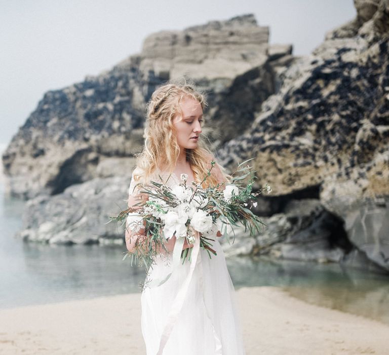 Bride in This Modern Love Bridal Lace Wedding Dress | Romantic Runaway Bride Wedding Inspiration at Chapel Porth beach in Cornwall, Styled by Boelle Events | Olivia Bossert Photography