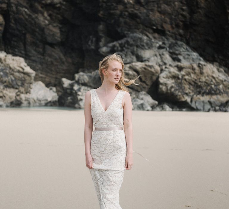 Bride in This Modern Love Bridal Lace Wedding Dress | Romantic Runaway Bride Wedding Inspiration at Chapel Porth beach in Cornwall, Styled by Boelle Events | Olivia Bossert Photography