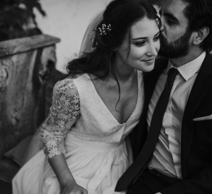 Bride in Donatelle Godart Wedding Dress &amp; Groom in De Fursac Suit Embracing