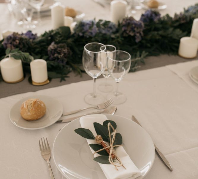 Elegant Place Setting with Olive Branch