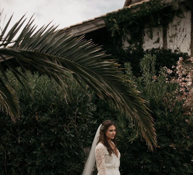 Bride in Donatelle Godart Wedding Dress  with Lace Long Sleeves