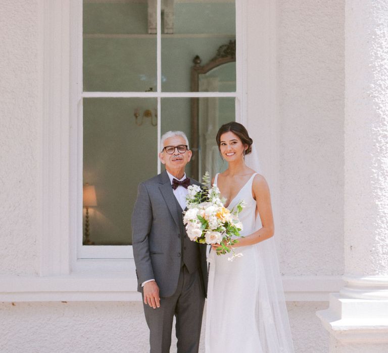 Bride with father about to walk down the aisle at Shilstone House wedding