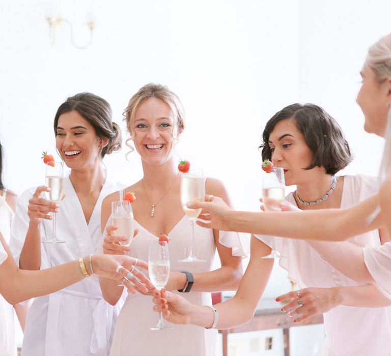 Bridal party preparations toasting the big day