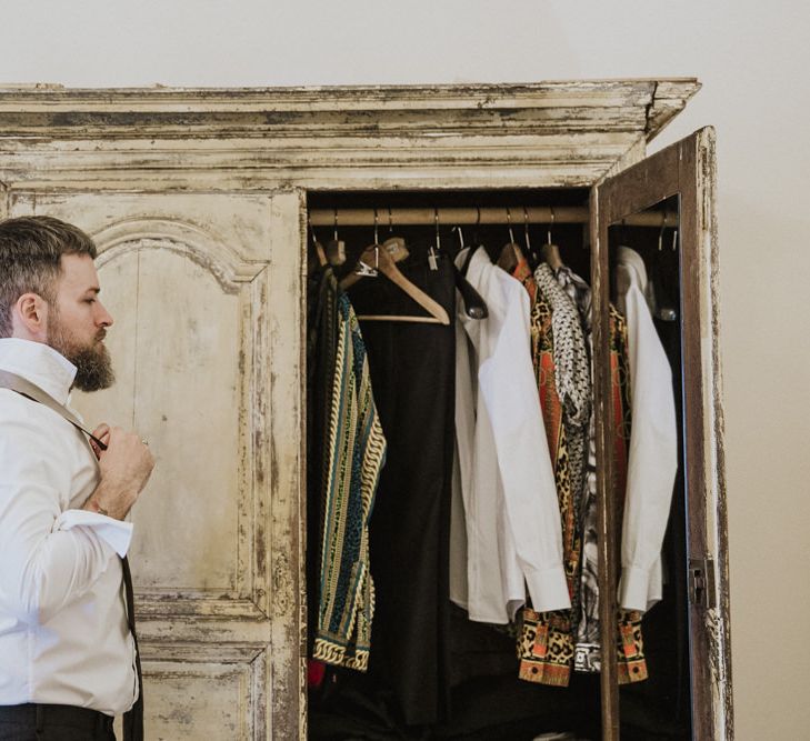 Groom preparation at same-sex wedding