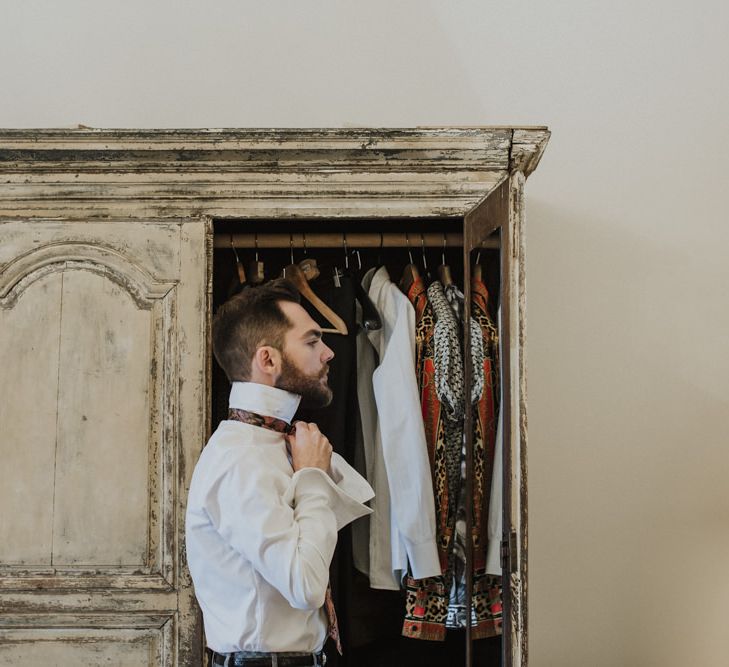 Groom getting ready for Sicily wedding