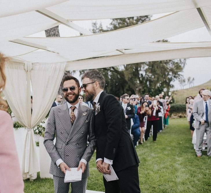 Grey groom suit for outdoor wedding ceremony