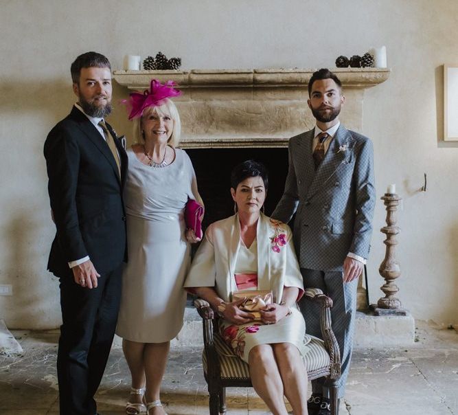 Grooms with their mothers in grey groom suit