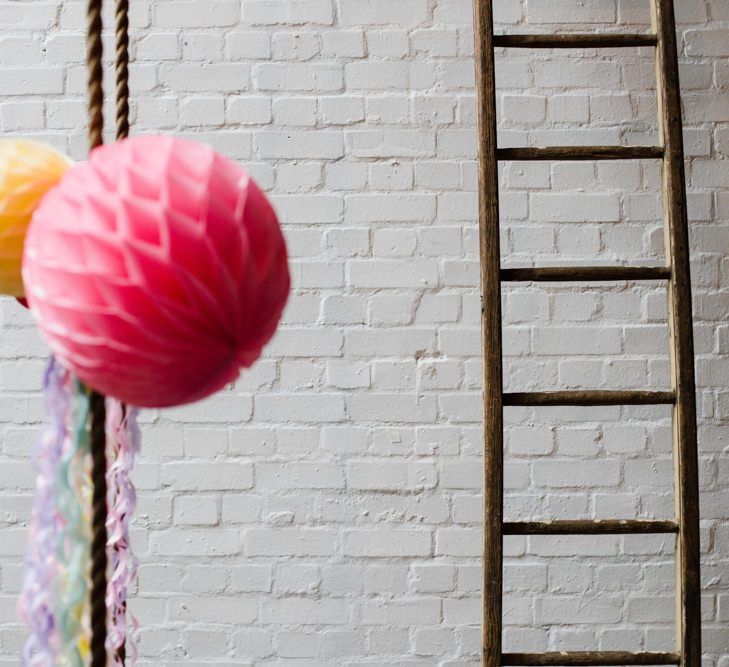 Pink and yellow paper lanterns for industrial wedding ceremony in London