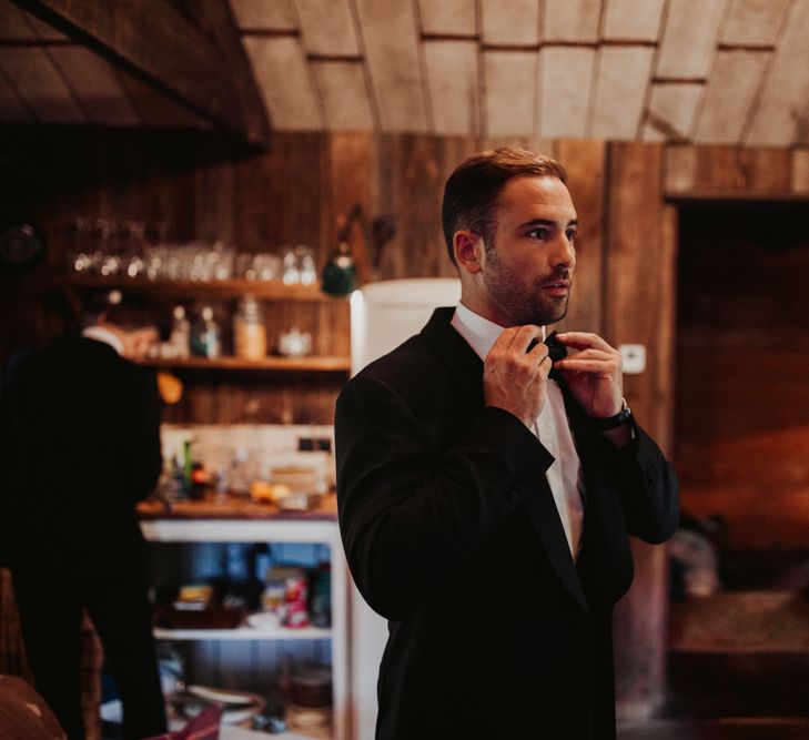 Groom getting ready on wedding morning