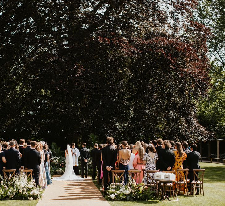 Outdoor wedding ceremony at Babington House