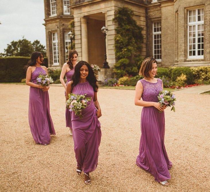 Bridesmaids in purple David's Bridal dresses