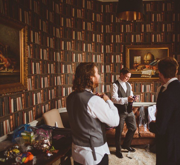 Groom getting ready on wedding morning at Hedsor House