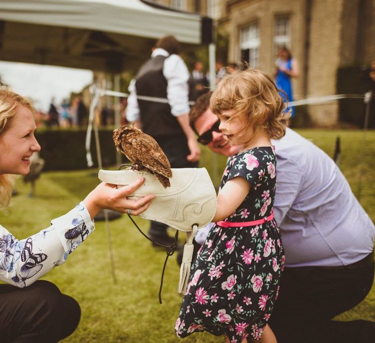 Wedding guests holding Falconry brides