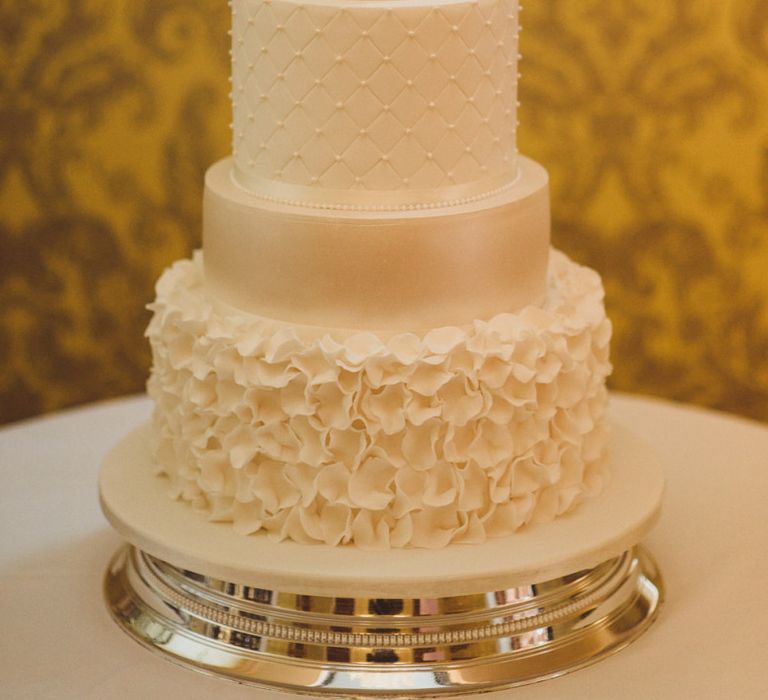 Elegant wedding cake with different iced layers