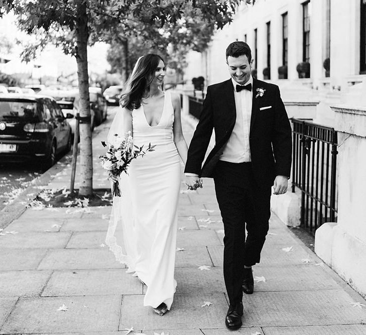 Bride and Groom steal a moment walking around East London