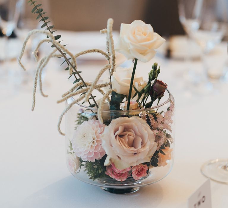 White and dusky pink floral centrepieces for relaxed and elegant city wedding