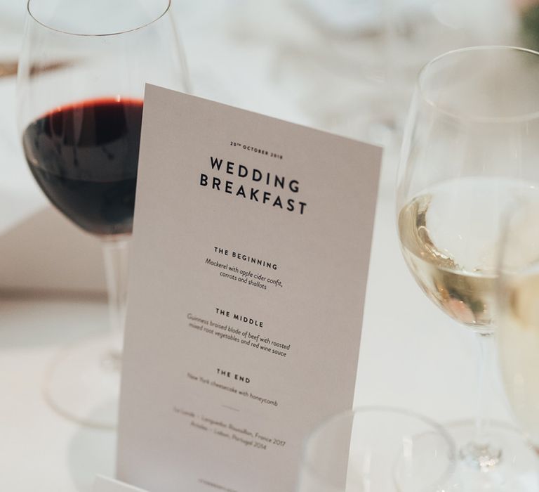 Personalised monochrome menus for Wedding Breakfast at city wedding with black bridesmaid dresses