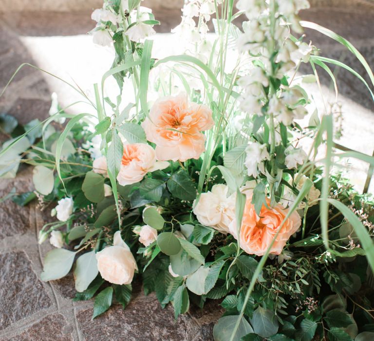 Tall Floral Arrangements with White Stocks, Peach Roses and Foliage