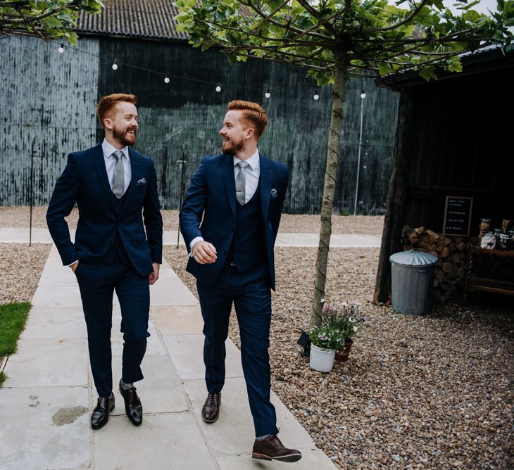 Groom and Twin Brother in Three-piece Navy Suits