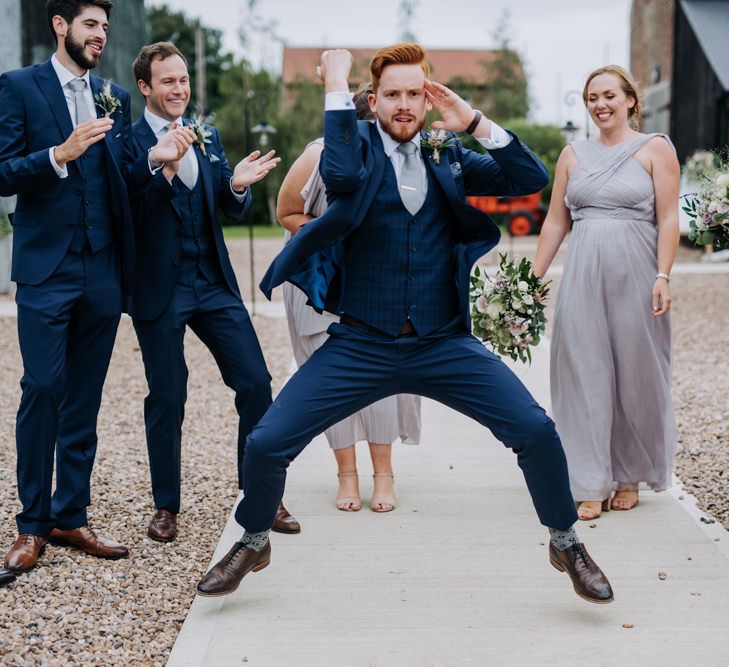 Wedding Party Having a Dance Off in The Wedding Venue's Courtyard