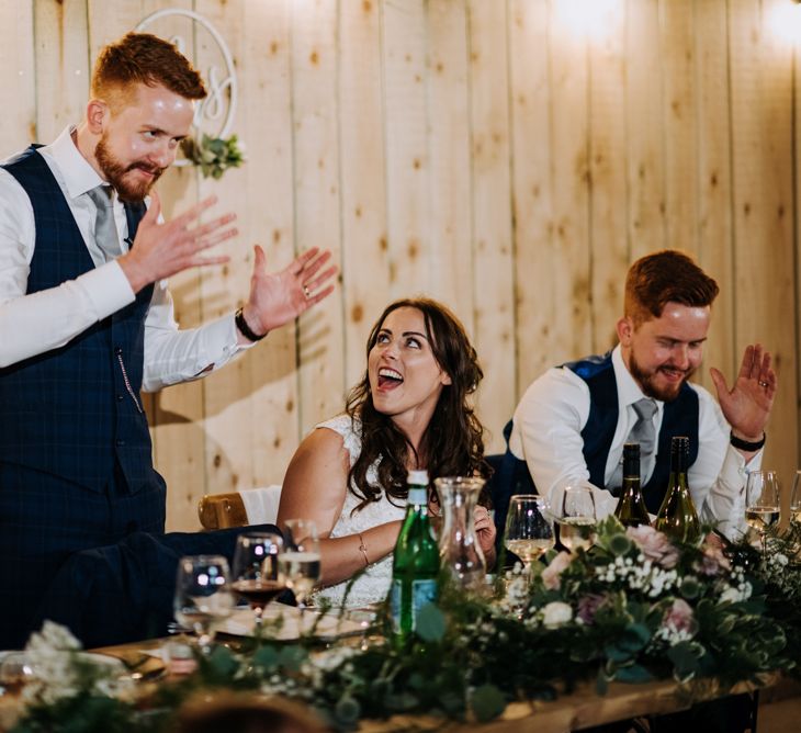 Groom in Navy Suit Giving Wedding Speech