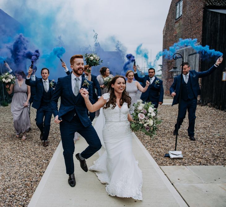 Wedding Party Holding Blue Smoke Bombs