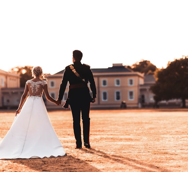 Sandhurst Military Academy Marquee Wedding With Bride In Pronovias Bridesmaids In Pink Dresses By Jarlo London Images From Peter Hughes Photography